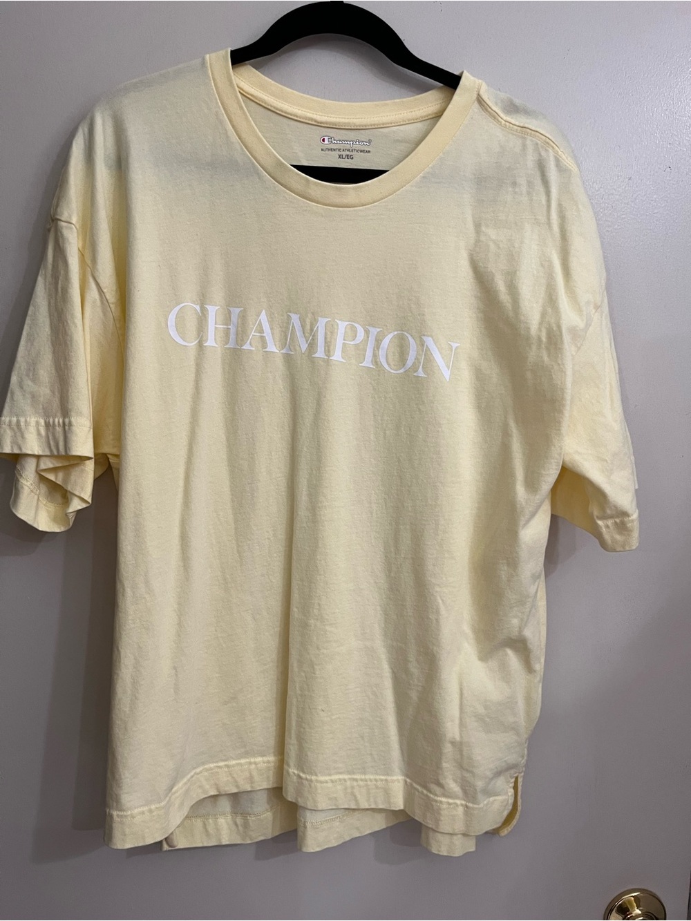 Champion lot of 2 Pale Yellow and gray Logo Short Sleeve Tees